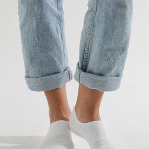 CW10_SWCH_WHITE_PT01 White no-show sock with ribbed arch support displayed on a light background.