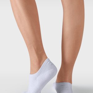 CW10_SWCH_WHITE_PT03 White no-show sock with ribbed arch support displayed on a light background.