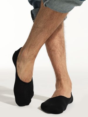 Smooth toe seam close-up on black dress socks