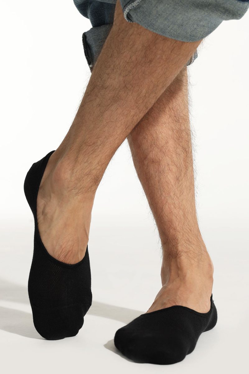 Smooth toe seam close-up on black dress socks