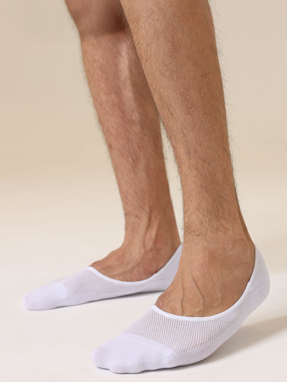 Smooth toe seam close-up on white dress socks