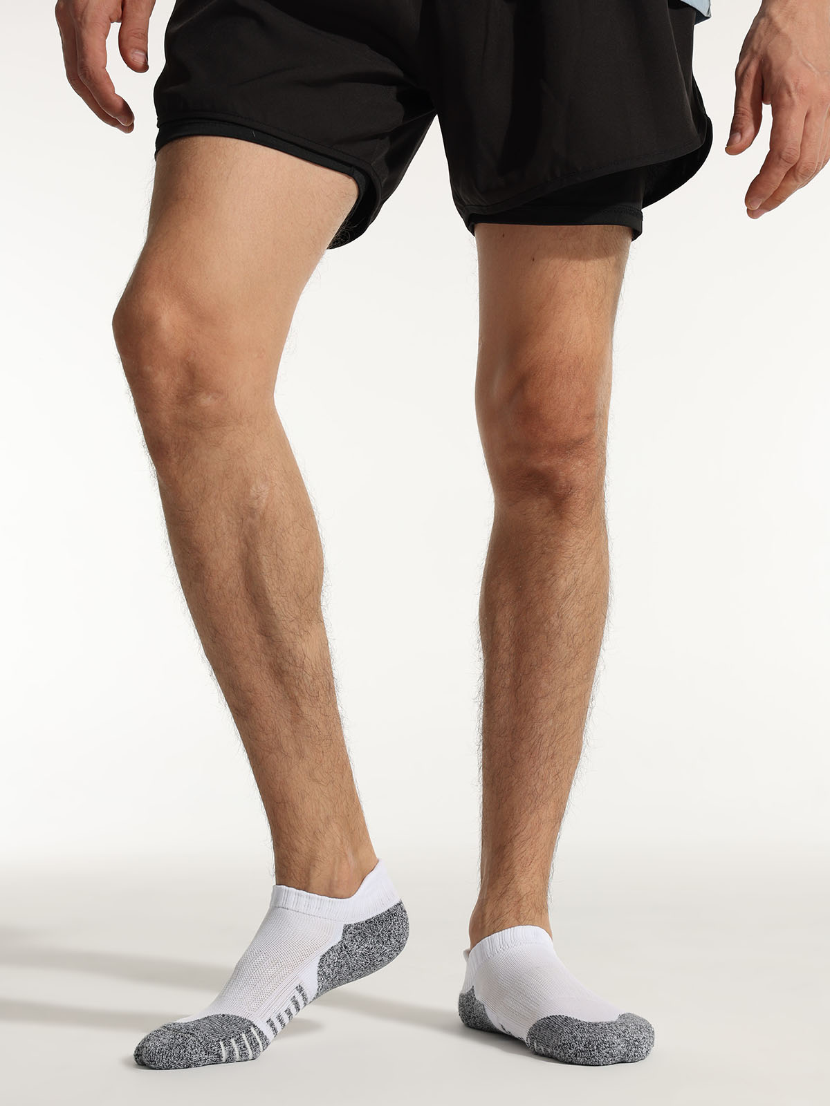 Soft athletic fabric detail on white men’s socks