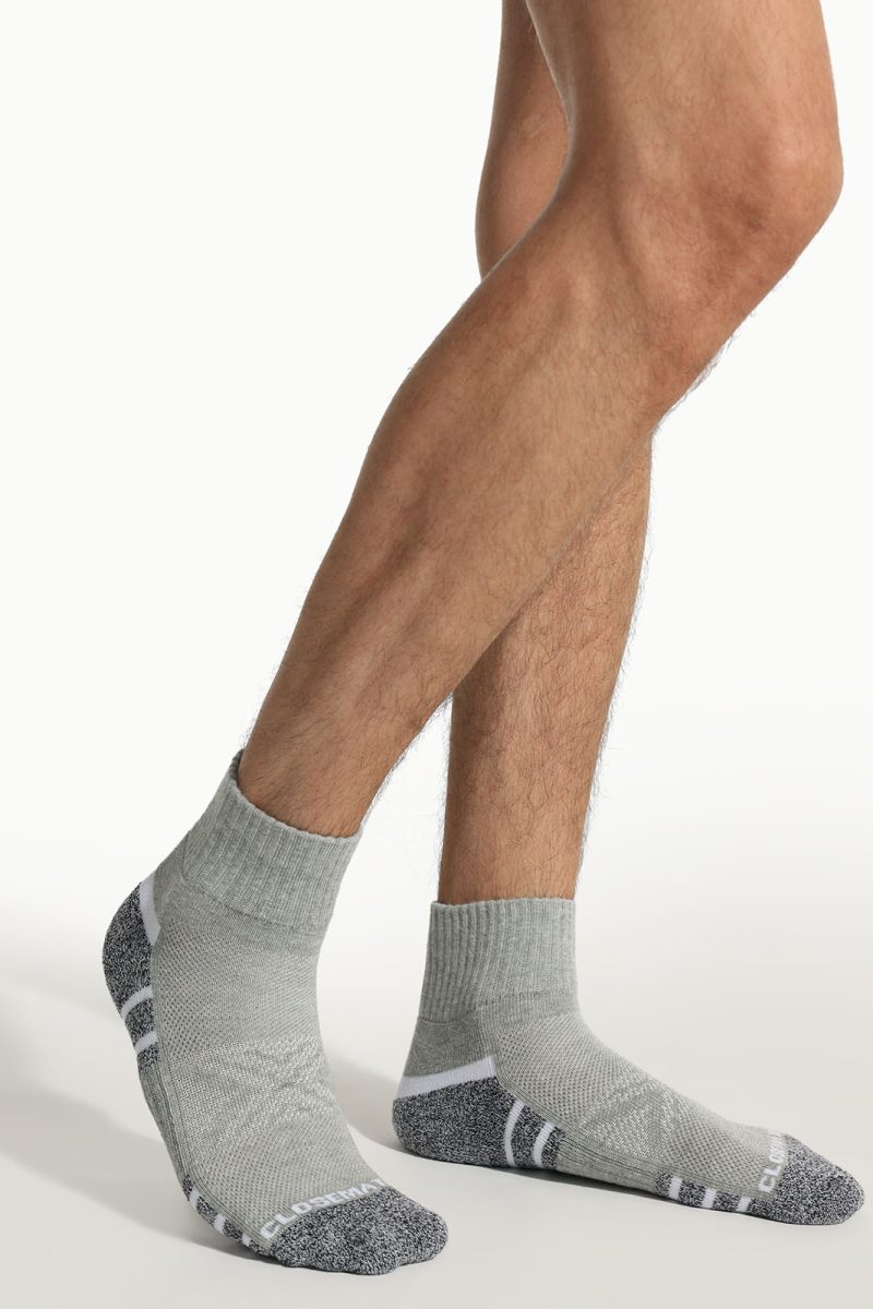 men wearing grey cushioned socks during workout