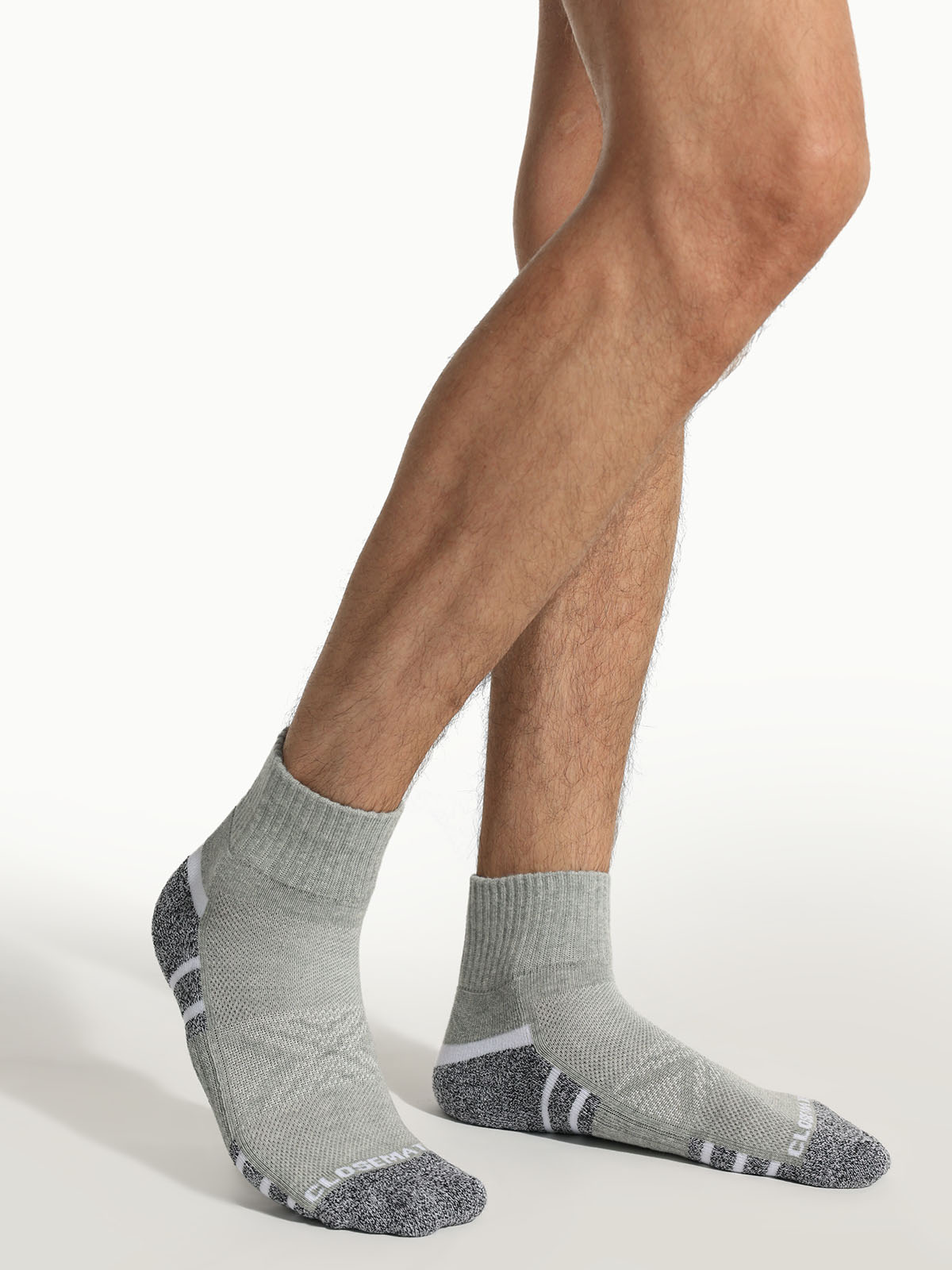 men wearing grey cushioned socks during workout