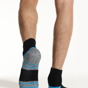 men wearing black blue cushioned socks during workout