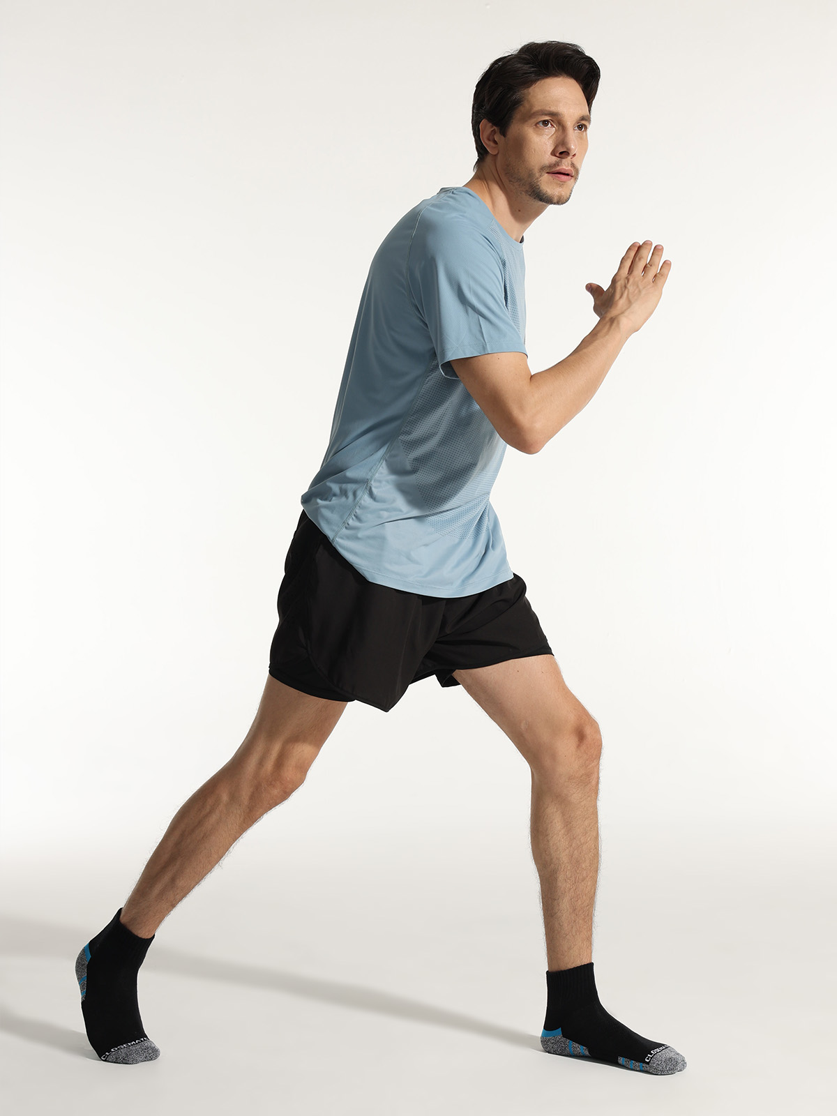 men wearing black blue cushioned socks during workout