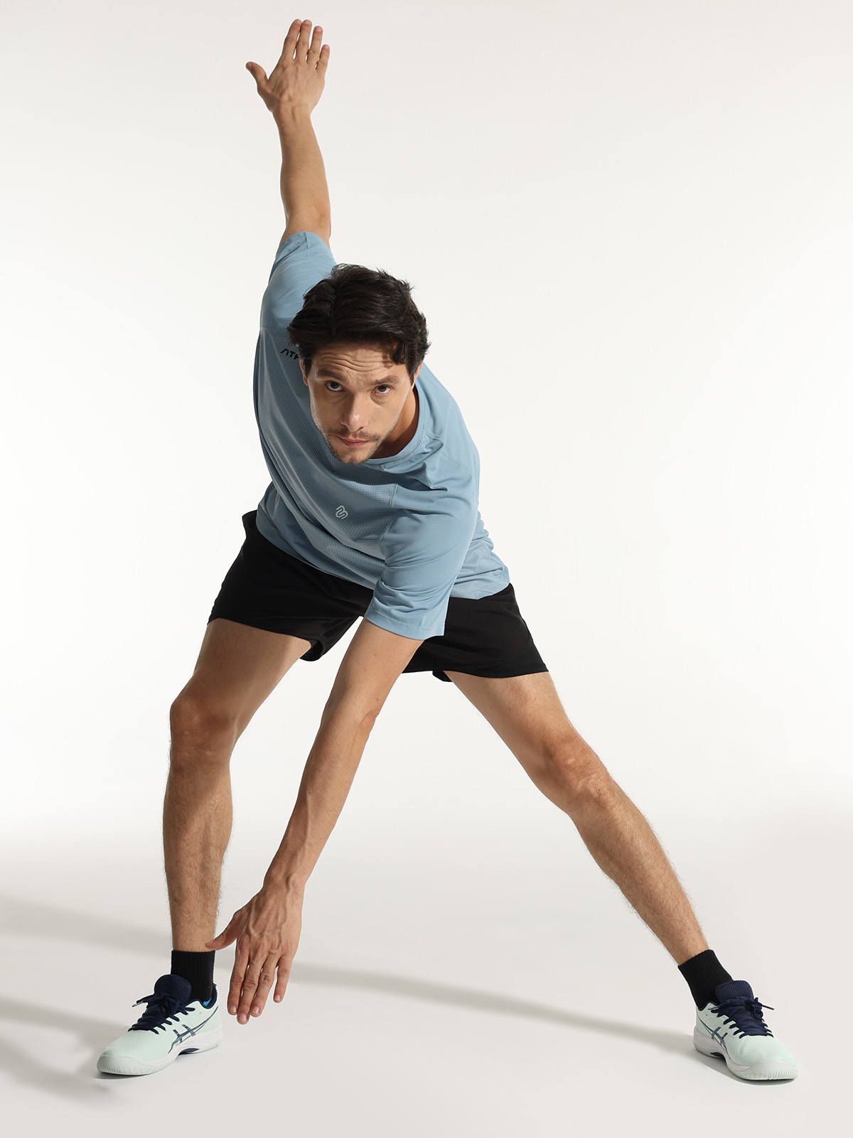 men wearing black blue cushioned socks during workout