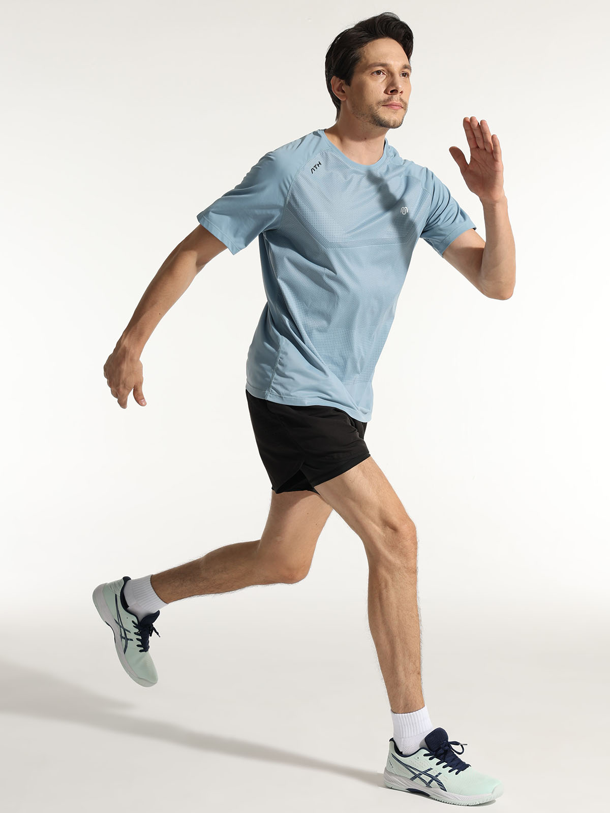 Close-up of cushioned sole on white athletic crew socks